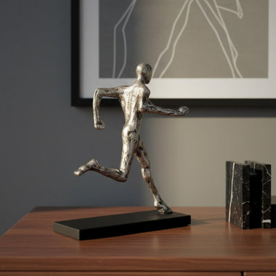 Metalstatuette af en løber med gravering