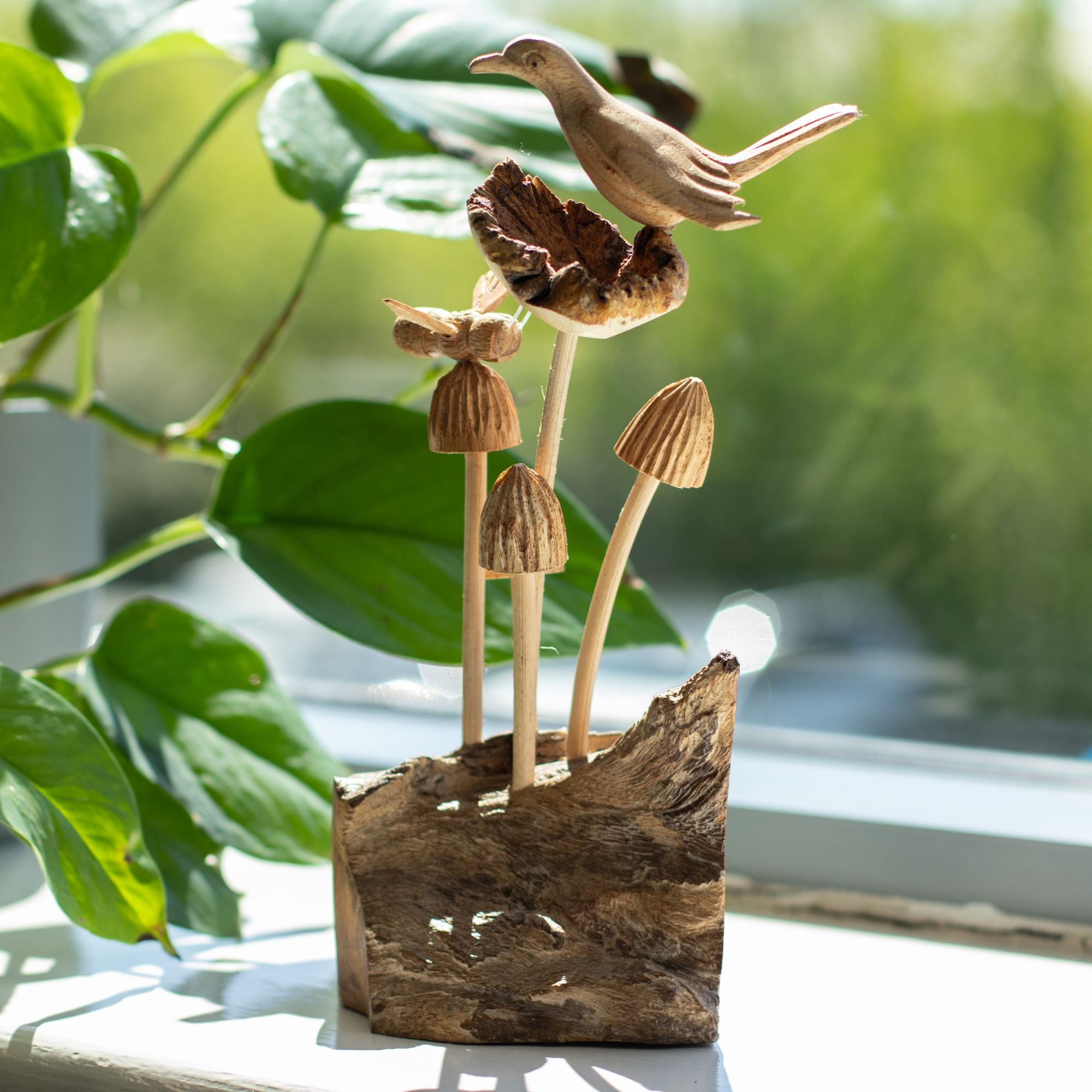 Skulptur i parasitisk træ