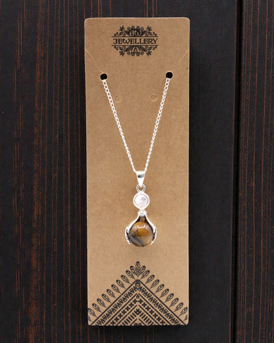 Crystal Hands – Vedhæng med helbredende hænder af tigerøje