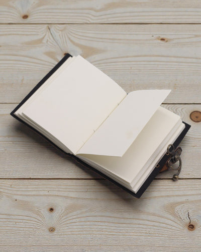 Lædernotatbog med motivationsmotiv Giv aldrig op på dine drømme – 17,8 × 12,7 cm